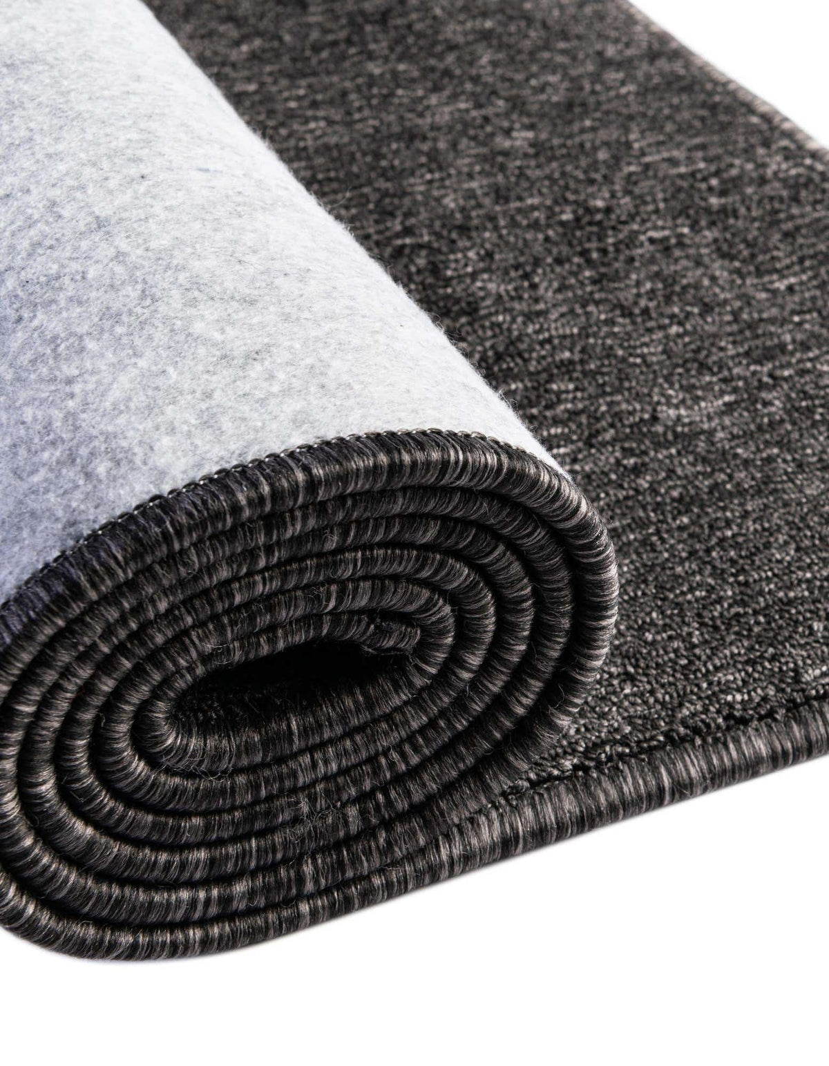 Rechteck Teppich Everyday Solid in Holzkohle von Hadorn™ - Lifestyle Image