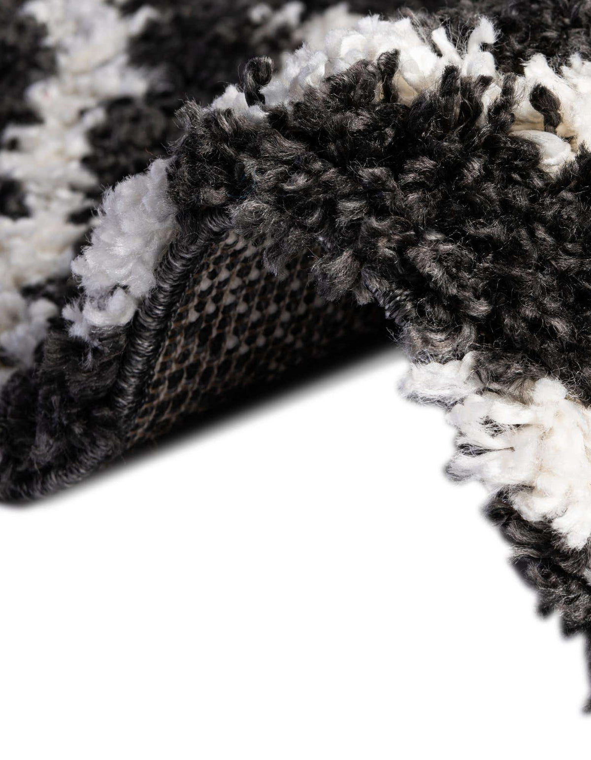 Rechteck Hochflorteppich Lagom Shag in Schwarz und Weiss von Hadorn™ - Lifestyle Image