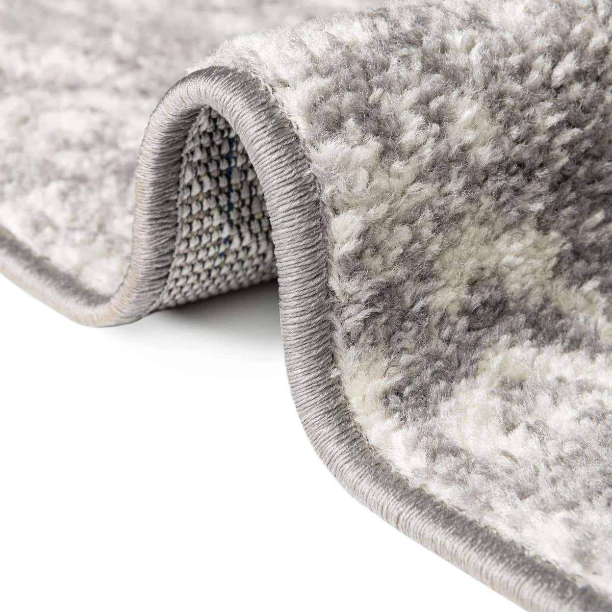 Quadratisch Teppich Lennon in Grau von Hadorn™ - Lifestyle Image